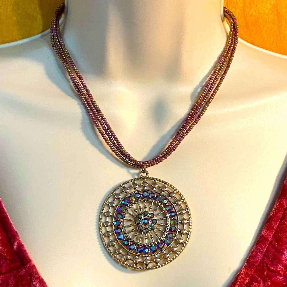 NWOT Erica Lyons necklace,multi strand metallic seed beads/ABS crystal medallion